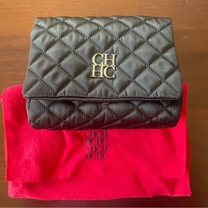 Authentic Carolina Herrera black clutch in mint conditions